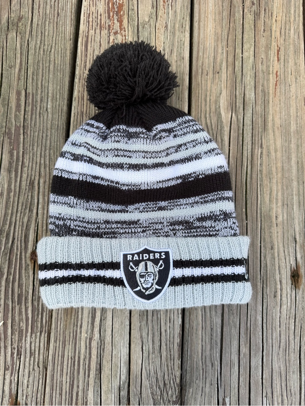 NFL Raiders Black and White Striped Pom Beanie